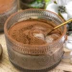 Spoon in a jar of Vegan Tiramisu Chia Pudding