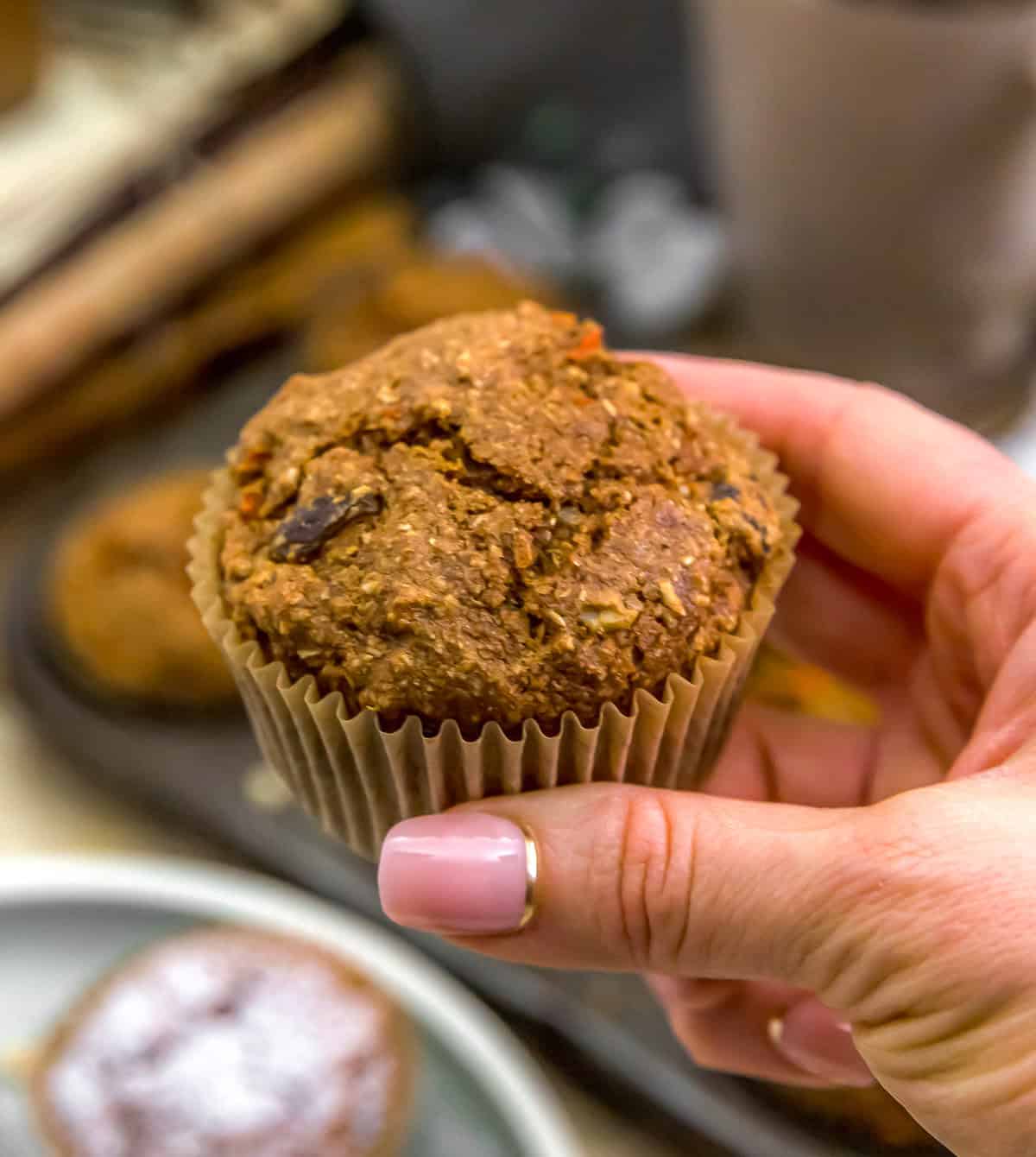 Holding a Healthy Carrot Wheat Bran Muffin