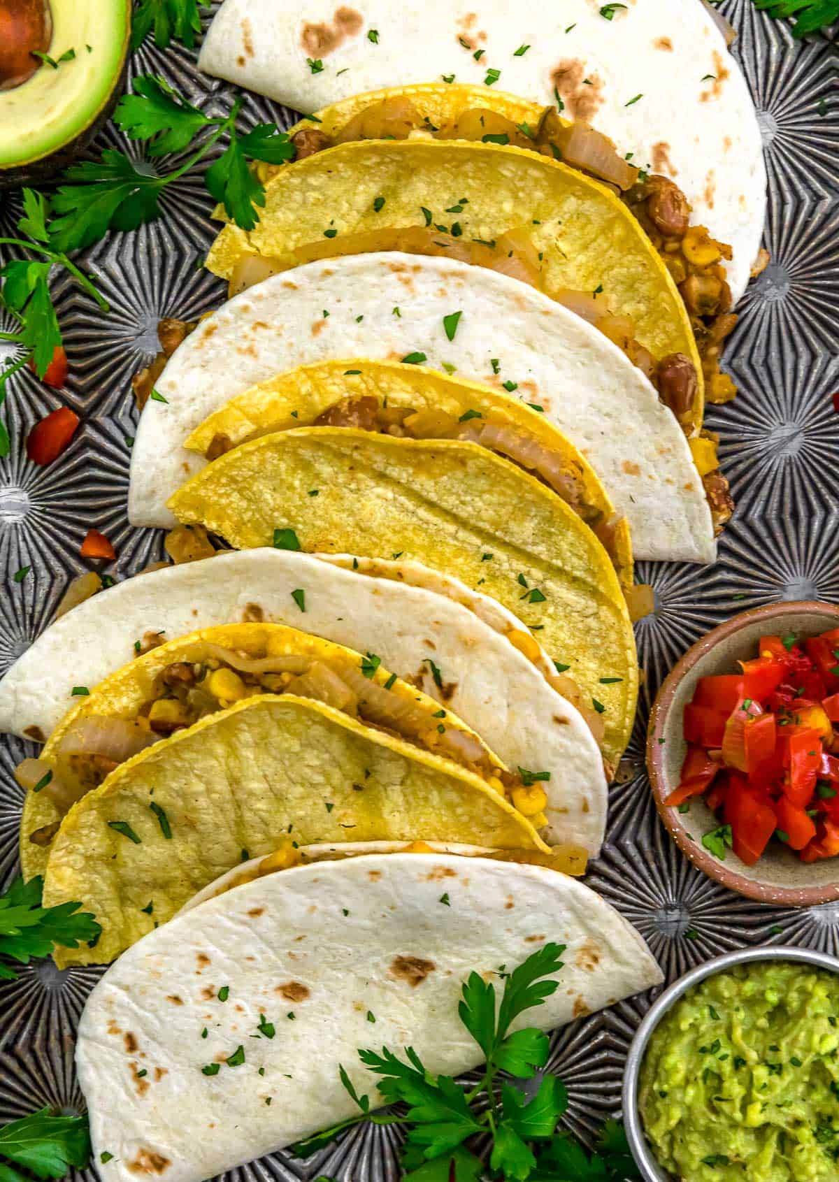 Close up of Smashed Pinto Bean and Grilled Onion Tacos