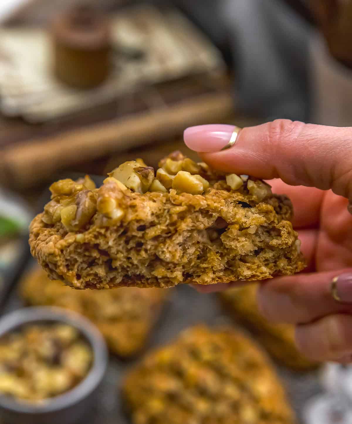 Holding a Vegan Maple Glazed Banana Nut Scone