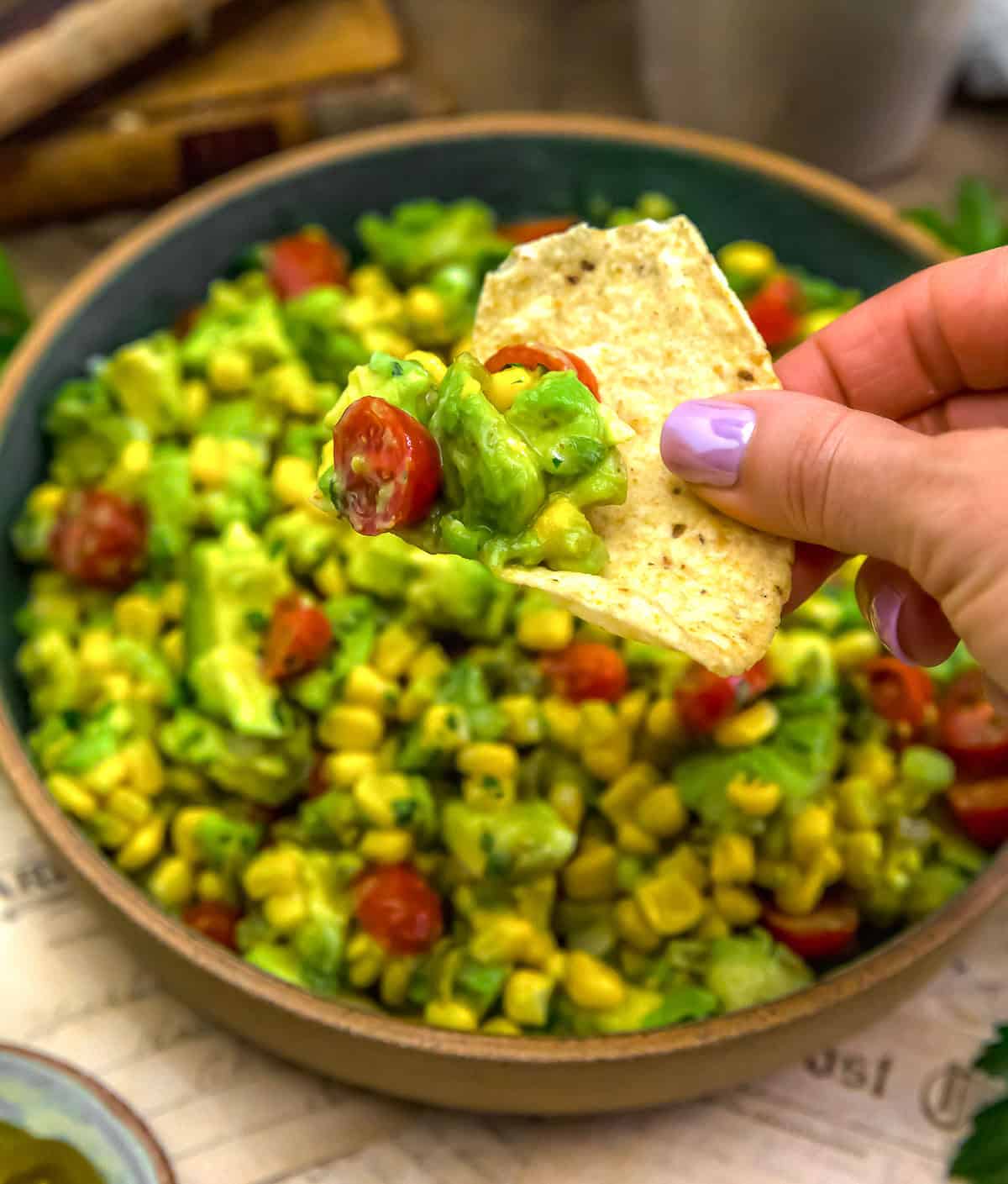 Pickled Jalapeño Avocado Corn Salad on a tortilla