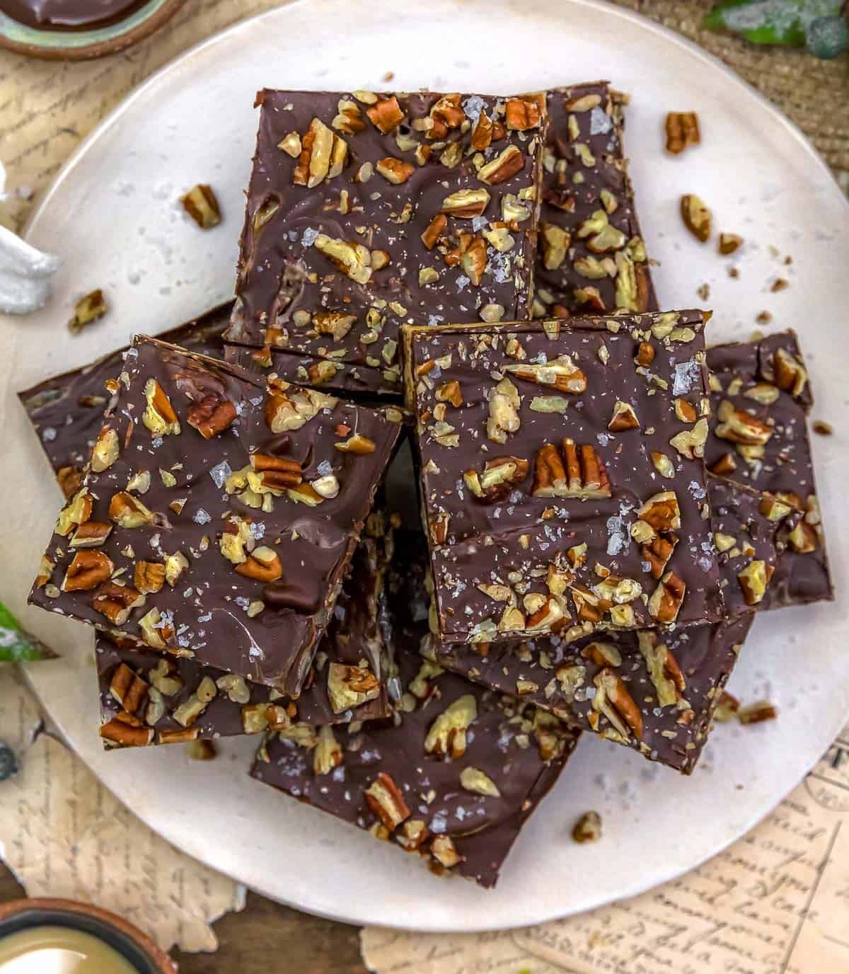 Plate full of Chocolate Pecan Date Tahini Bars