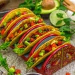 Easy Smoky Black Bean Corn Enchilada Tacos in a holder