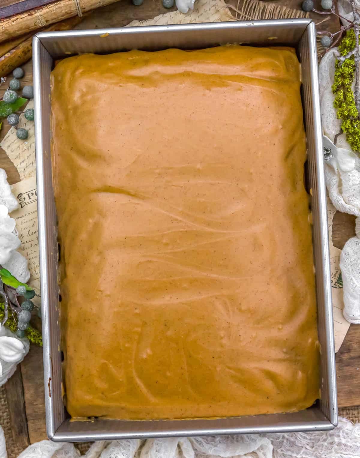 Vegan Peanut Butter Banana Sheet Cake in the pan with frosting