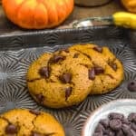 Two cookies of Vegan Healthy Pumpkin Chocolate Chip Cookies